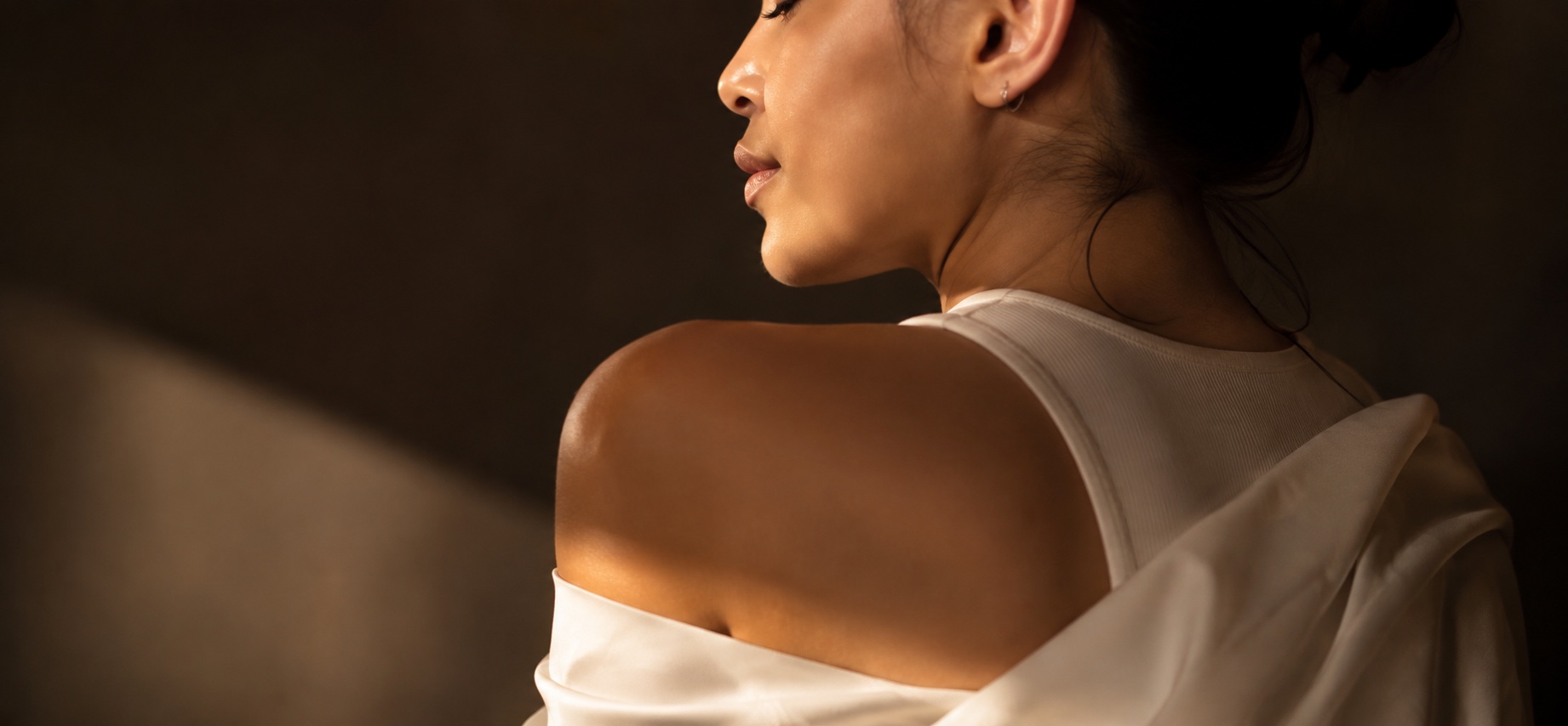 Editorial portrait lit in warm golden light